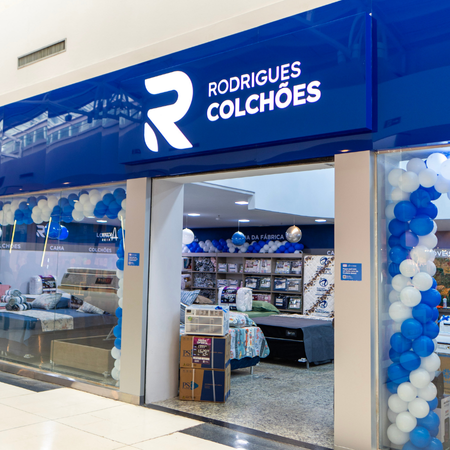 Logo da loja rodrigues colchões